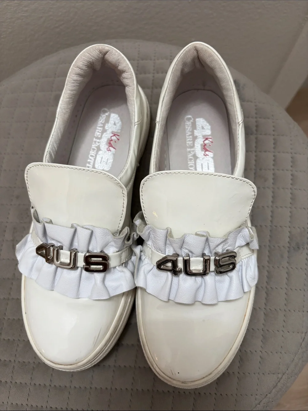 Cesare Paciotti White Patent Leather Slip-Ons with Ruffle Detail